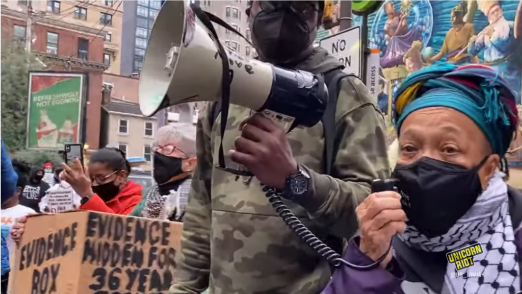 Protesters rallying for Mumia Abu-Jamal's freedom.